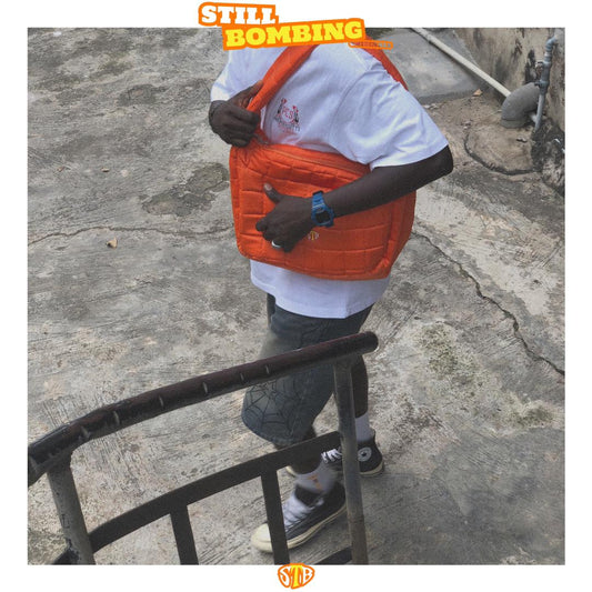 Still Bombing Originals Orange Puffer Bag.